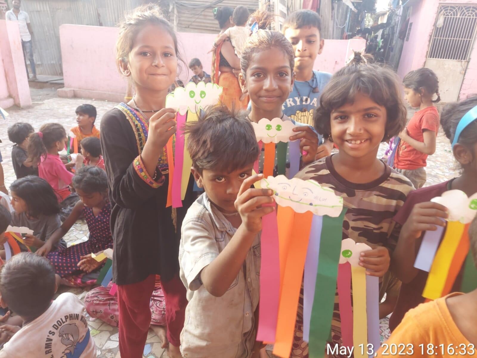 Children showing handmade paper lantern crafts